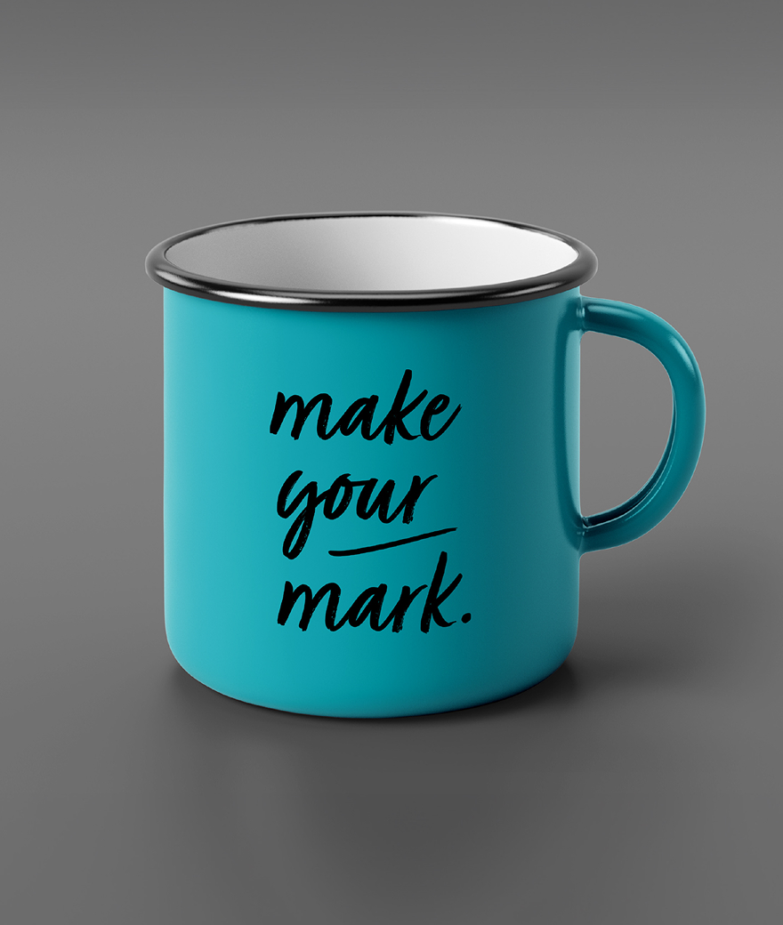 IndelibleCoaching-Mug A teal enamel mug with the motivational phrase "make your mark" in black letters. It has a simple, modern design on a gray background.