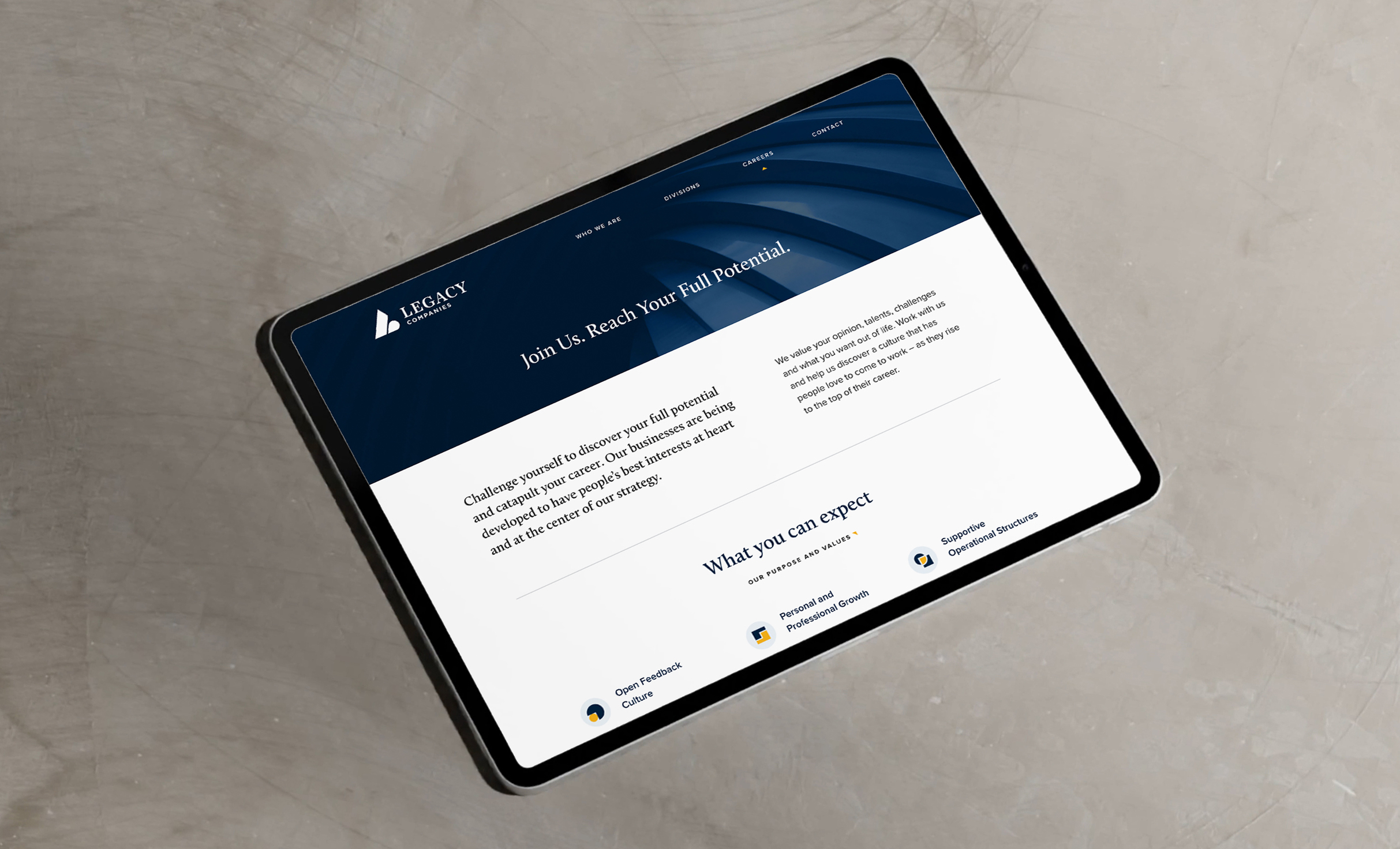 Legacy-Tablet A tablet displaying the Legacy Companies website with a navy and white design. The header reads, "Join Us, Reach Your Full Potential." The modern layout emphasizes empowerment.