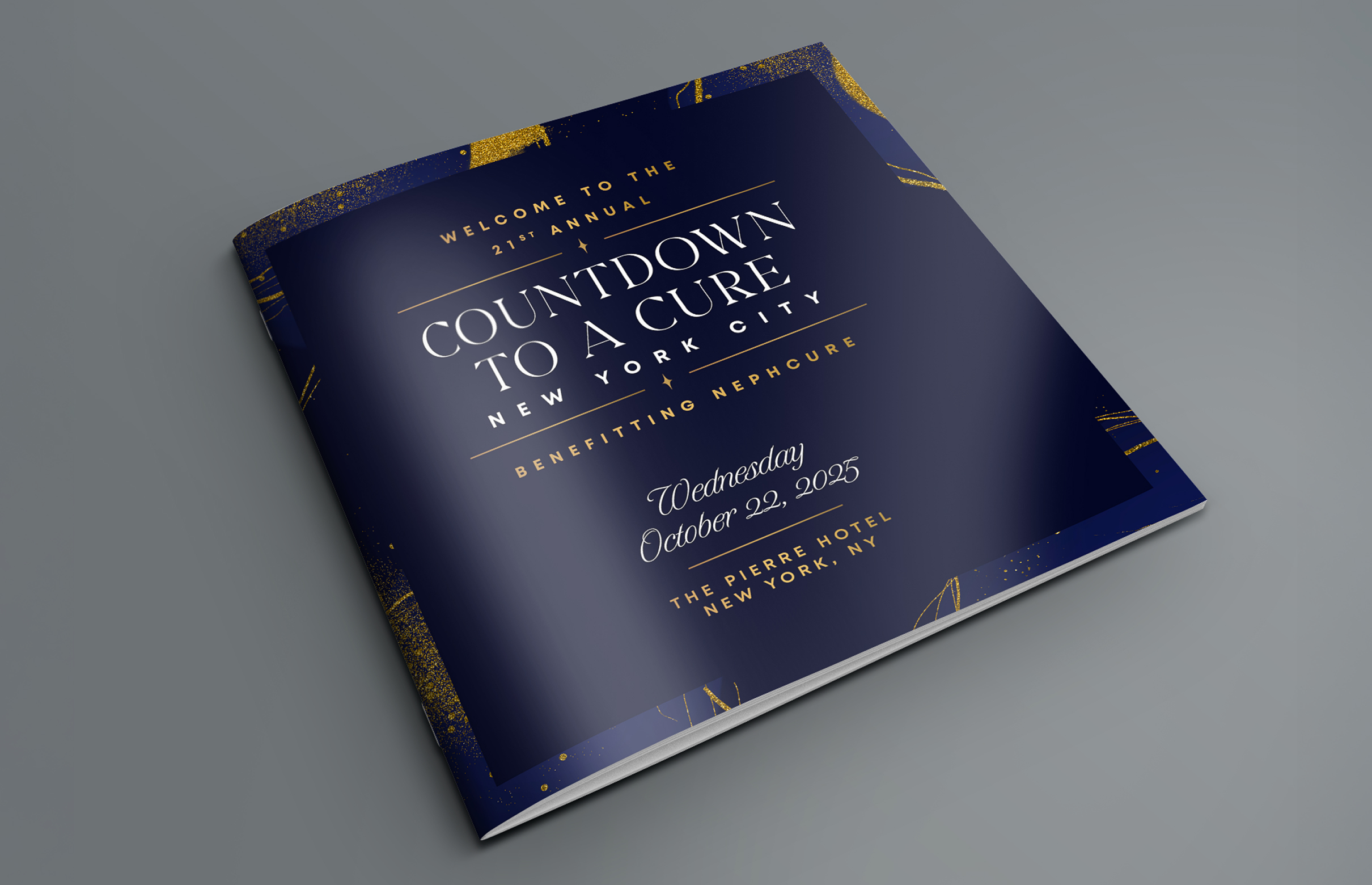 Program book cover in navy blue with gold accents. Text reads "Countdown to a Cure, New York City, October 22, 2025, benefiting NephCure."