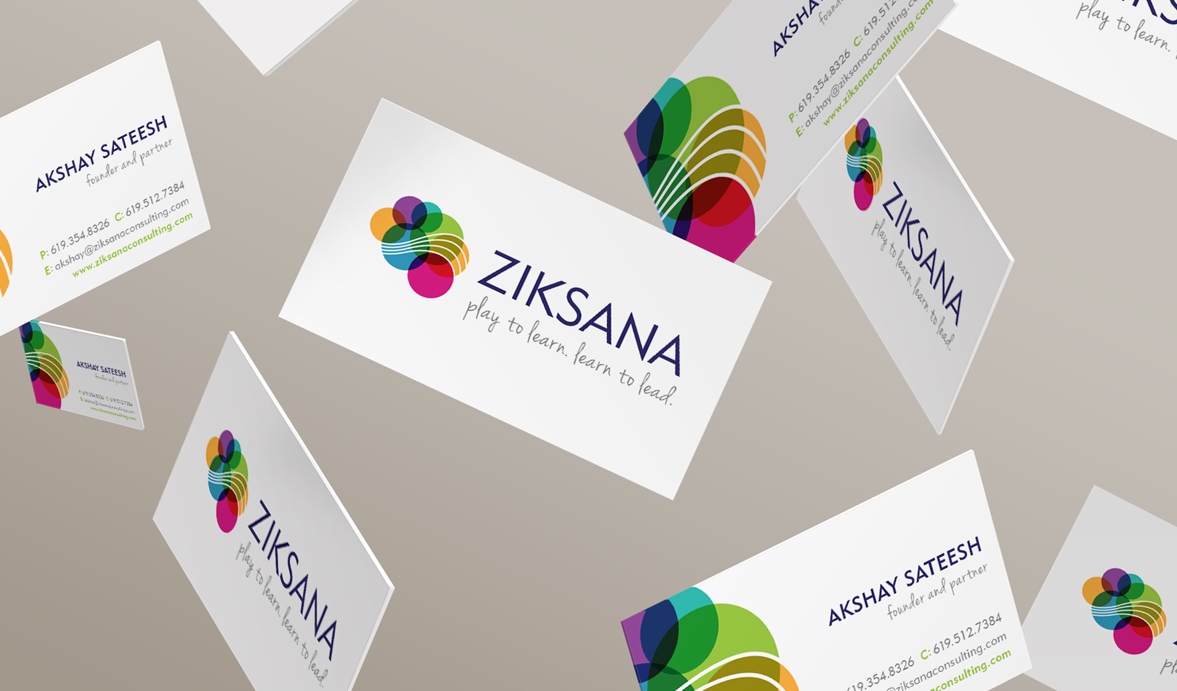 Floating business cards display the "Ziksana" logo with vibrant, overlapping circles. Cards feature a name and playful tagline, conveying creativity and professionalism.