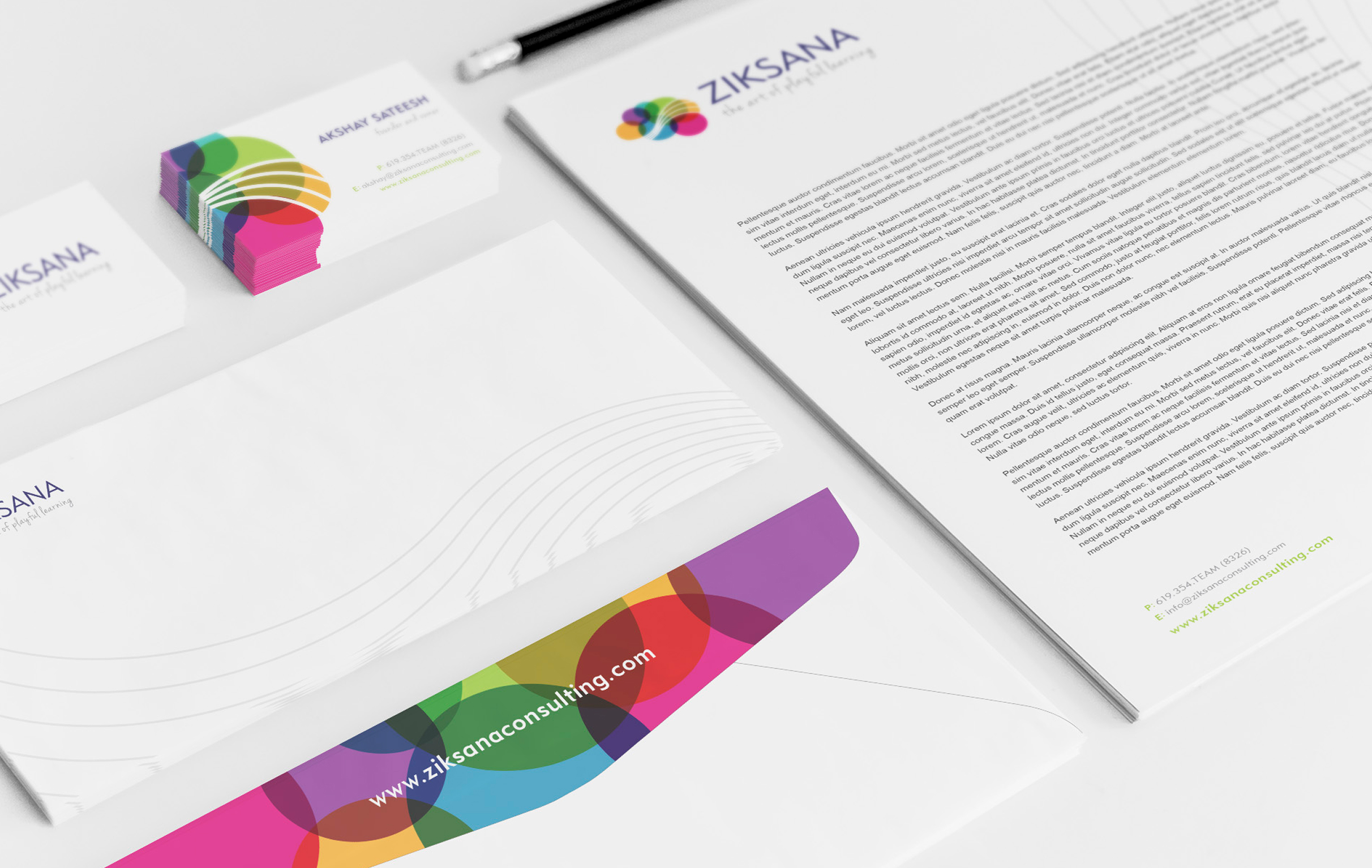 Corporate stationery set featuring Ziksana branding. Includes a letterhead, business cards, and envelope with colorful overlapping circle design.